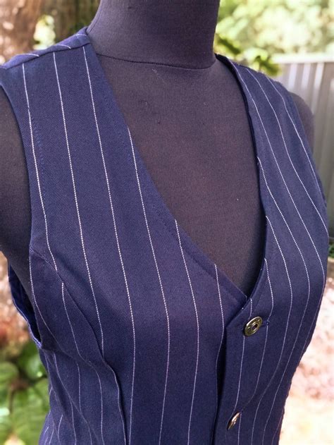 navy blue pinstripe waistcoat.